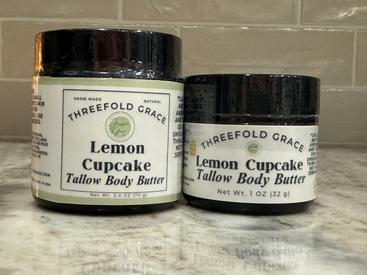 Two glass jars of Lemon Cupcake Tallow Body Butter with essential oils
